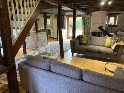 Coin salon dans l'établissement Le Figuier - 4 bedroom Farmhouse Gite