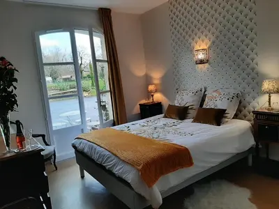 Un ou plusieurs lits dans un hébergement de l'établissement Chateau de Mornay