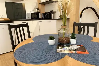 Cuisine ou kitchenette dans l'établissement Le NOTRE DAME - HYPER CENTRE - WIFI - NETFLIX