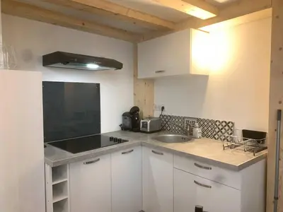 Cuisine ou kitchenette dans l'établissement Le NOTRE DAME - HYPER CENTRE - WIFI - NETFLIX