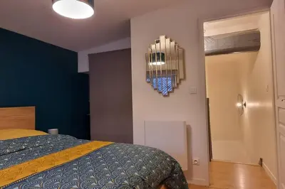 Un ou plusieurs lits dans un hébergement de l'établissement Maisonnette design Le Cosy - Marché à 3mn à pied - Parking gratuit à 50m - Amazon Prime -