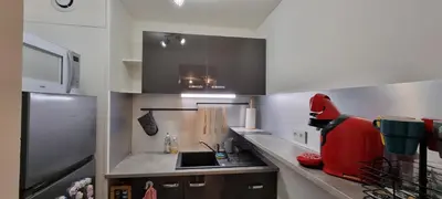 Cuisine ou kitchenette dans l'établissement Maisonnette design Le Cosy - Marché à 3mn à pied - Parking gratuit à 50m - Amazon Prime -