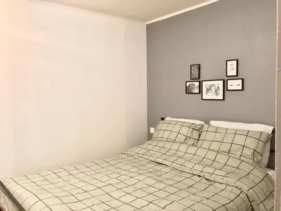 Un ou plusieurs lits dans un hébergement de l'établissement Jungle Cosy Appartement