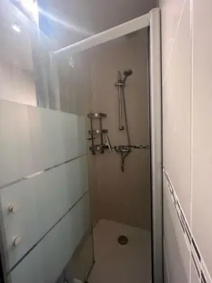 Salle de bains dans l'établissement Le P'tit Gris Studio cosy et rénové