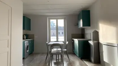Cuisine ou kitchenette dans l'établissement La Source