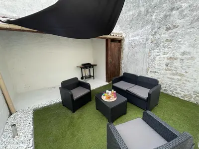 Coin salon dans l'établissement Le Boinot - Patio privé, wifi haut débit, Netflix, stationnement gratuit