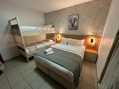 Un ou plusieurs lits dans un hébergement de l'établissement Hôtel Le Prince, Poitiers Gare