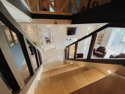 Télévision ou salle de divertissement dans l'établissement Domaine de Saint Florent - Piscine & Spa
