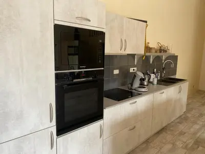 Cuisine ou kitchenette dans l'établissement Chambres des Lunes