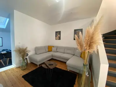 Coin salon dans l'établissement Agréable et vaste maison Angoulême centre ville
