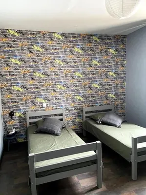 Un ou plusieurs lits dans un hébergement de l'établissement la maison du dauphin