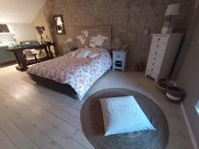 Un ou plusieurs lits dans un hébergement de l'établissement Gîte de charme dans ancienne seigneurie