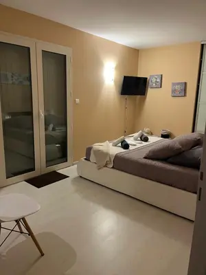 Télévision ou salle de divertissement dans l'établissement Chambres d hôtes Villa Anani Cosson alex