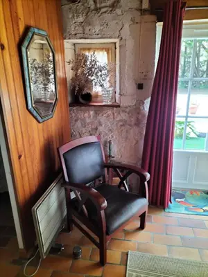 Coin salon dans l'établissement Chambre de caractere