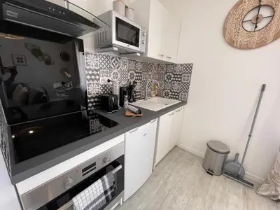 Cuisine ou kitchenette dans l'établissement Le Bohème - Centre Ville, Netflix et WIFI, parking, idéal familles, couples et voyages d'affaire