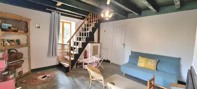 Coin salon dans l'établissement Le Terrier maison de campagne 250 m2 grande capacité 20 couchages, 4500m2 de terrain