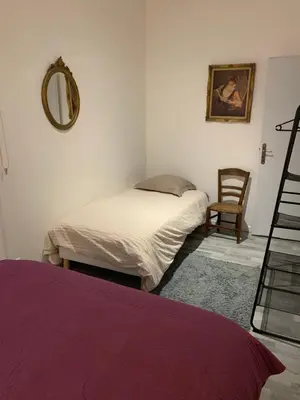 Un ou plusieurs lits dans un hébergement de l'établissement La maison d’Eloi