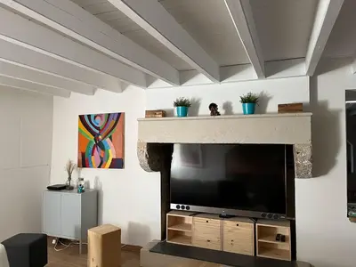 Télévision ou salle de divertissement dans l'établissement Ogite'85