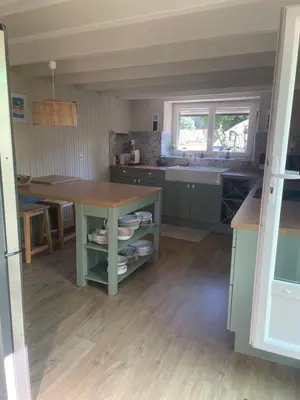 Cuisine ou kitchenette dans l'établissement Ogite'85