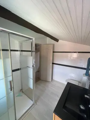 Cuisine ou kitchenette dans l'établissement Ogite'85