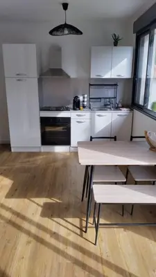 Cuisine ou kitchenette dans l'établissement Les loges