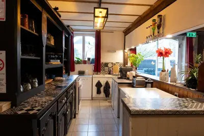 Cuisine ou kitchenette dans l'établissement L’entre deux vignes
