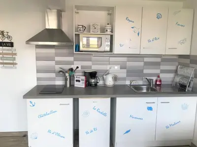 Cuisine ou kitchenette dans l'établissement LA MAISON DU BONHEUR