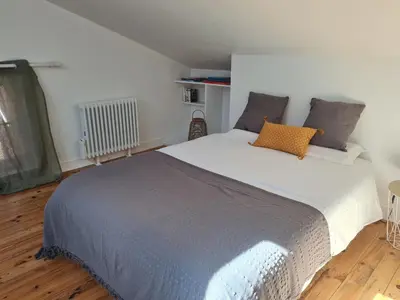 Un ou plusieurs lits dans un hébergement de l'établissement Maison de Campagne cosy