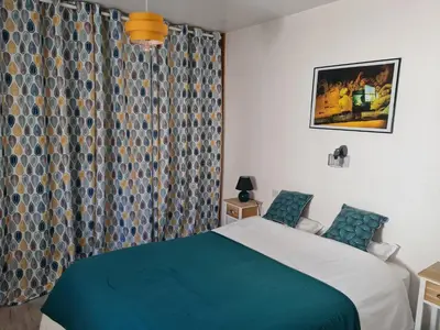 Un ou plusieurs lits dans un hébergement de l'établissement Maison de Campagne cosy