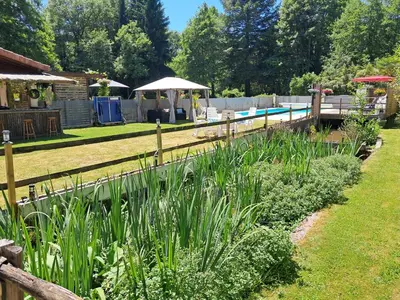Jardin de l'établissement Moulin Du Pommier Glamping & Camping
