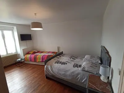 Un ou plusieurs lits dans un hébergement de l'établissement Maison de ville de 95M2