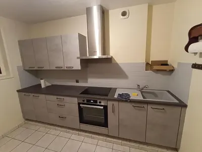 Cuisine ou kitchenette dans l'établissement Maison de ville de 95M2