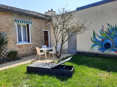 Jardin de l'établissement Maison Cosy