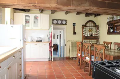 Cuisine ou kitchenette dans l'établissement La Maison du Passeur