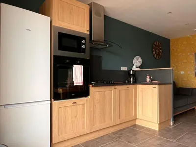 Cuisine ou kitchenette dans l'établissement les gîtes du péré