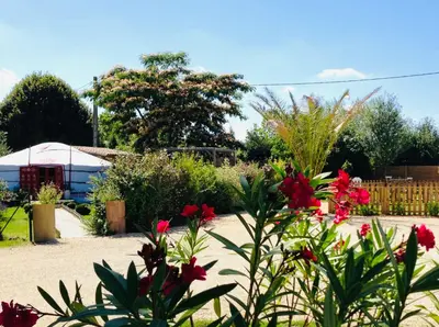 Jardin de l'établissement Home Paradis & Spa - Ecolodge