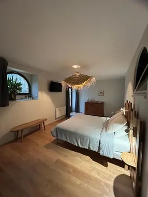 Un ou plusieurs lits dans un hébergement de l'établissement Chambres d'hôtes de la pilatière