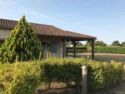 Jardin de l'établissement Villa in Les Forges with Golf & Pool Access