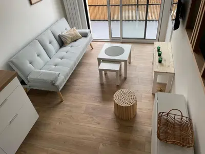 Coin salon dans l'établissement Superbe appartement La Rochelle