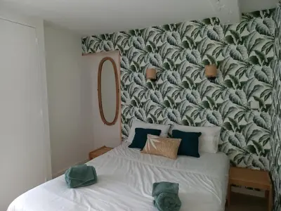 Un ou plusieurs lits dans un hébergement de l'établissement Maison cocooning à 20 min des plages
