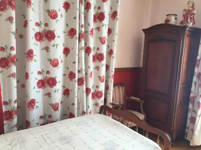 Un ou plusieurs lits dans un hébergement de l'établissement La Maison aux Roses