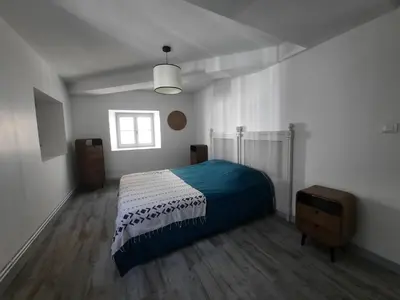 Un ou plusieurs lits dans un hébergement de l'établissement DUPLEX place du marché