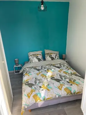 Un ou plusieurs lits dans un hébergement de l'établissement Logement en bord de port