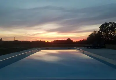 Lever ou coucher de soleil vu de la maison de vacances ou à proximité