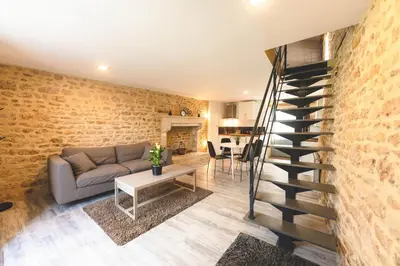 Coin salon dans l'établissement Domaine des Tilleuls