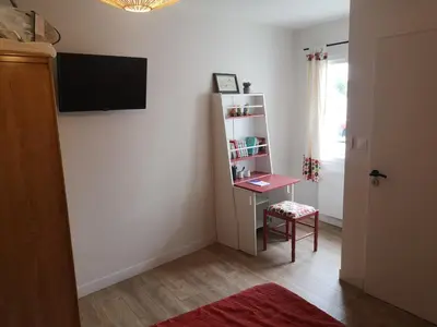 Télévision ou salle de divertissement dans l'établissement L'Annexe