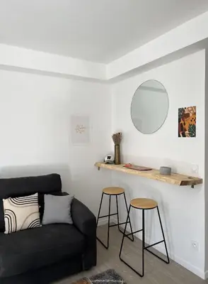 Coin salon dans l'établissement Appartement situé en plein coeur du centre-ville