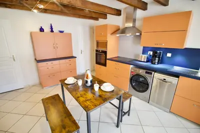 Cuisine ou kitchenette dans l'établissement O Trois Oliviers