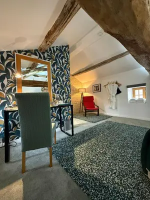 Un ou plusieurs lits dans un hébergement de l'établissement Maison Dix Tusson