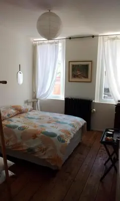 Un ou plusieurs lits dans un hébergement de l'établissement La maison de Dom